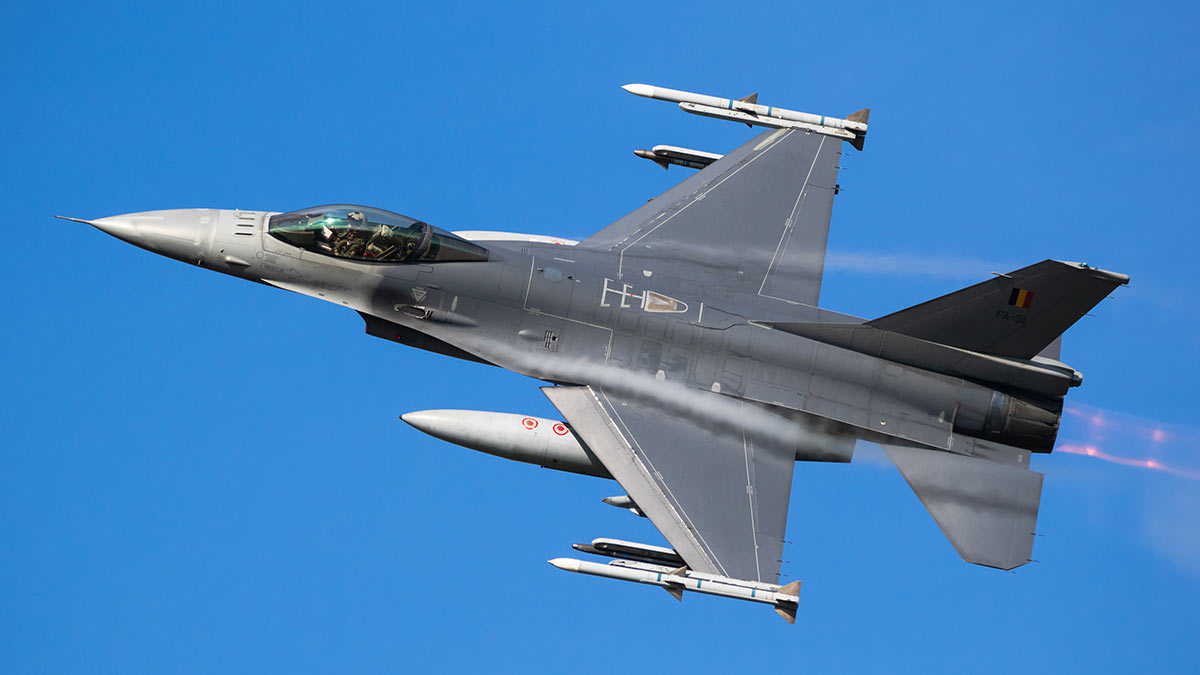 :   F-16,     